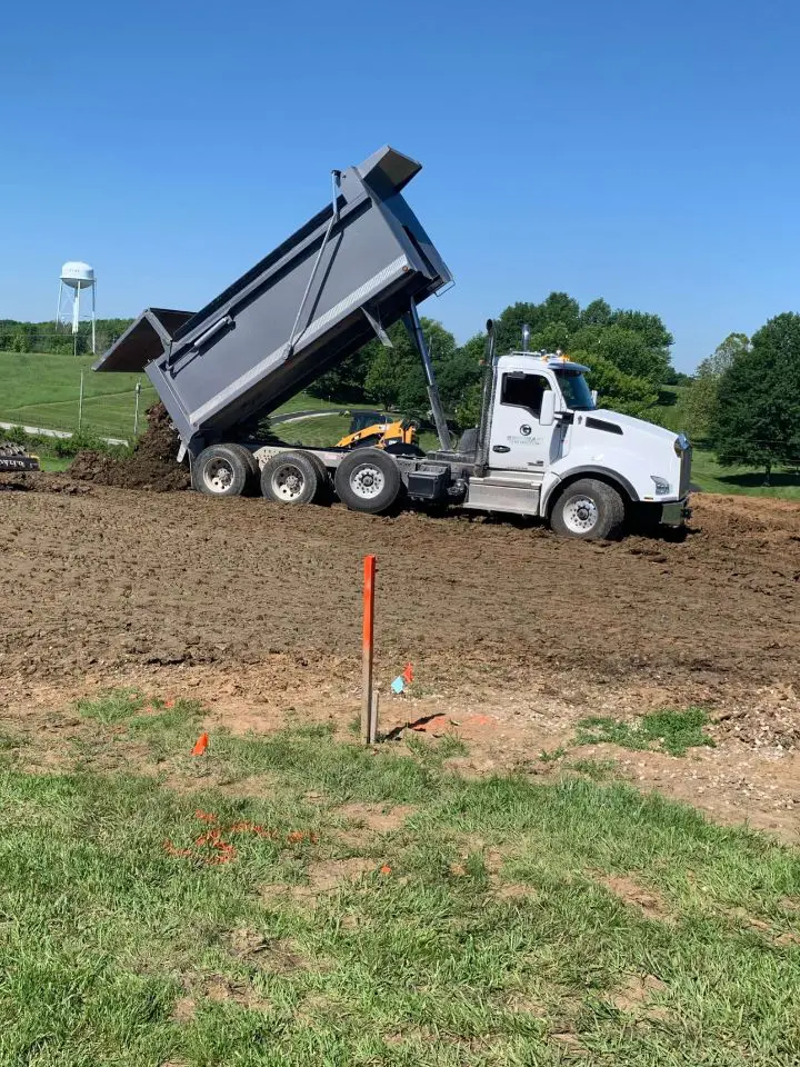A truck hauling soil